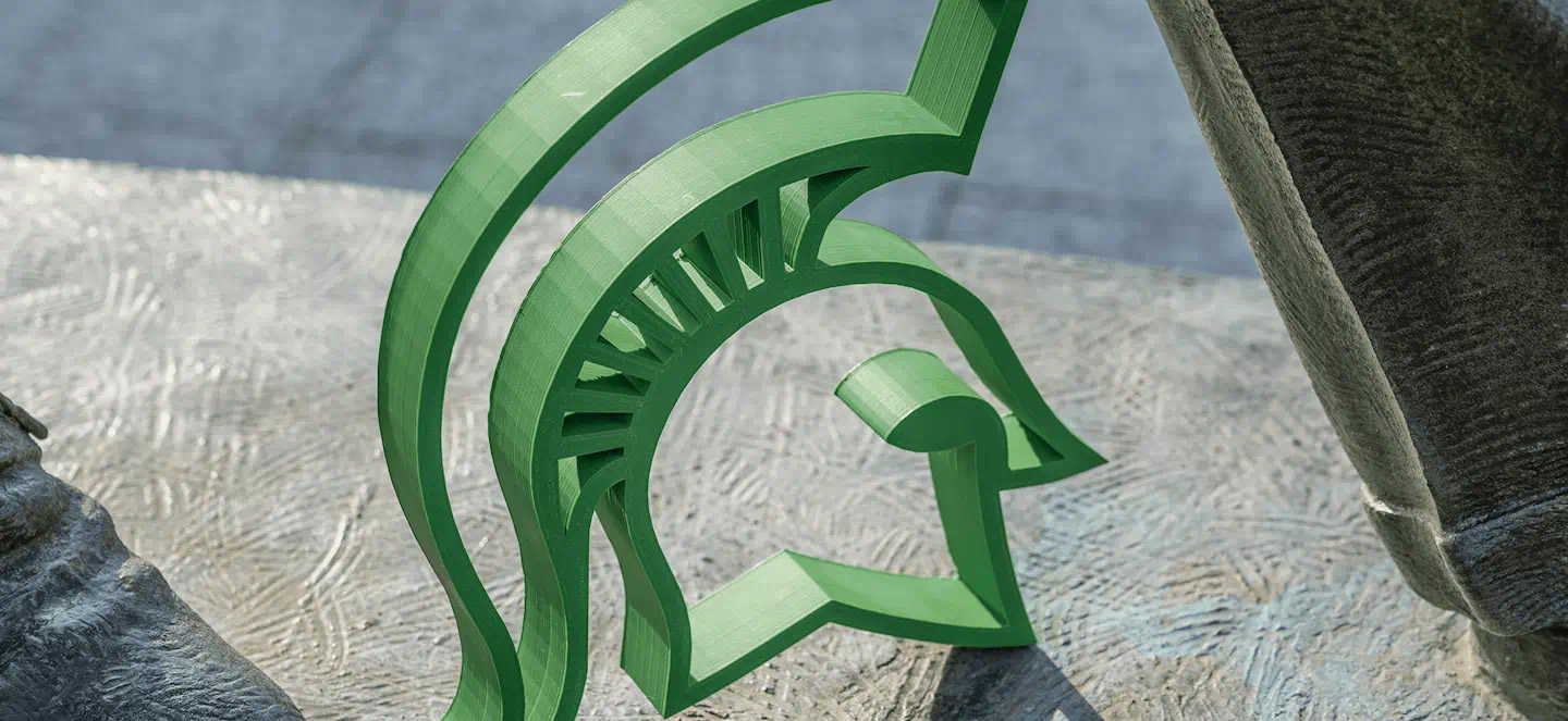 Green wooden Spartan logo 