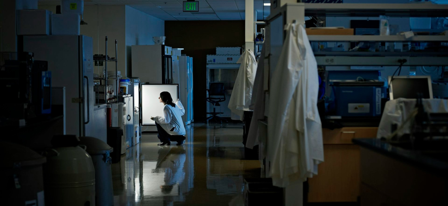 A person in a lab opening equiptment